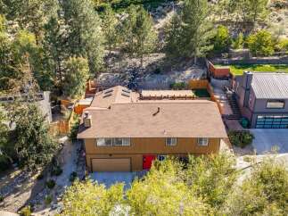 Discover this stunning property featuring a spacious backyard with a covered patio, perfect for outdoor entertaining.