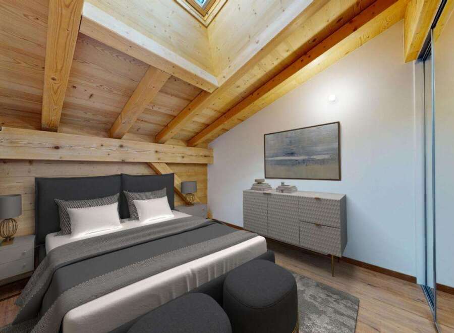 Experience rustic charm and modern comfort in this beautifully appointed bedroom, featuring exposed wooden beams and a skylight that floods the space with natural light.