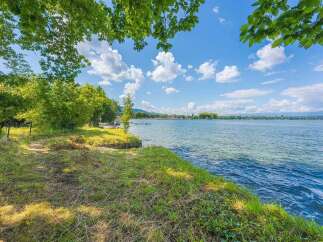 Enjoy serene lakefront living with this stunning property offering direct access to crystal-clear waters.