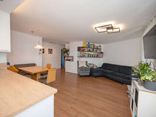 Discover this inviting open-concept living space, perfect for modern living and entertaining.