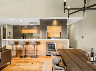Experience modern living in this stunning open-concept kitchen and dining area.