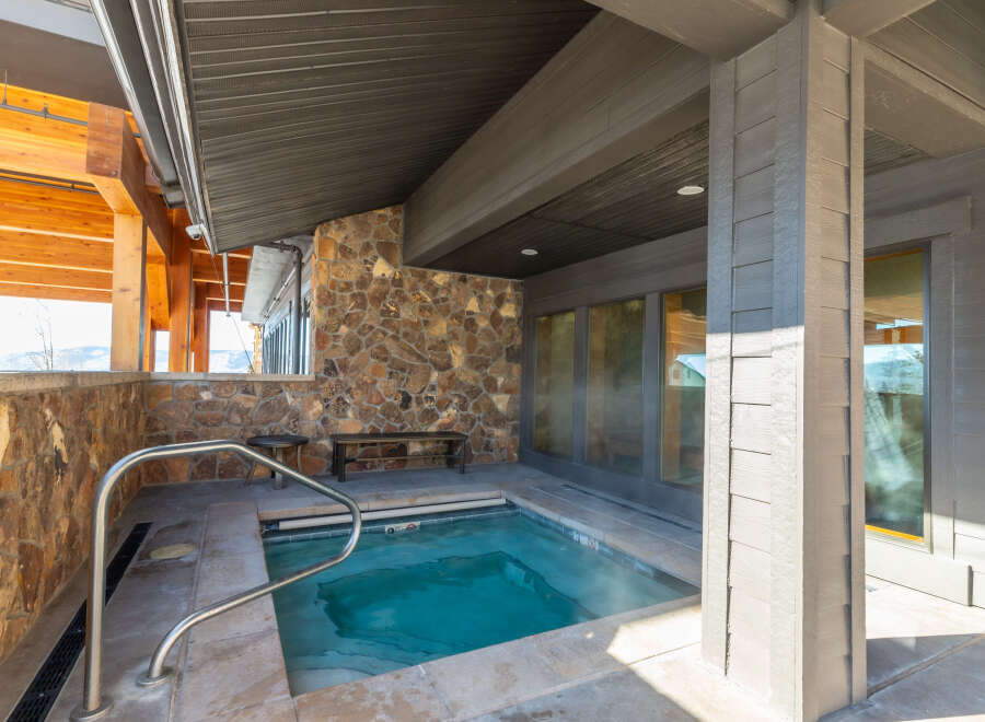 Indulge in relaxation with this private outdoor hot tub, perfect for unwinding after a day of adventure.