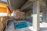 Indulge in relaxation with this private outdoor hot tub, perfect for unwinding after a day of adventure.