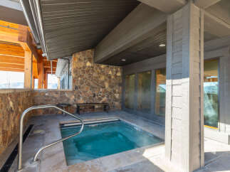 Indulge in relaxation with this private outdoor hot tub, perfect for unwinding after a day of adventure.