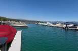 Experience the ultimate lakeside lifestyle with this stunning property featuring a private dock and multiple boat slips.