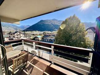 Enjoy breathtaking mountain views from this charming balcony, perfect for morning coffee or evening relaxation.