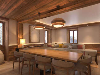 Experience luxury mountain living in this stunning dining and living area, featuring a large wooden dining table perfect for gatherings and a plush sectional sofa for ultimate relaxation.