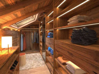 Experience luxury mountain living in this stunning walk-in closet, featuring rich wooden finishes and integrated LED lighting.