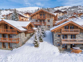 Experience the ultimate winter getaway in this stunning chalet, nestled in a picturesque snowy mountain village.