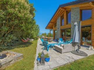 Experience luxurious outdoor living with this stunning property, featuring a spacious patio perfect for entertaining and relaxing.