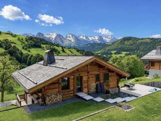 Experience luxury mountain living in this stunning wooden chalet, nestled amidst breathtaking alpine scenery.