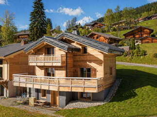 Experience luxury mountain living in this stunning wooden chalet, nestled amidst the picturesque Alps.