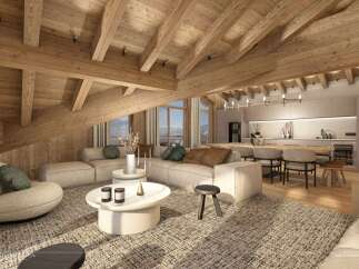 Experience luxurious alpine living in this stunning penthouse with a vaulted wooden beam ceiling and panoramic mountain views.