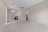 This spacious upstairs landing offers a bright and airy feel, perfect for a home office or additional living space.