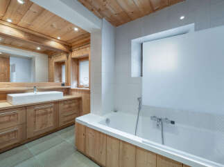 Experience rustic charm and modern comfort in this beautifully appointed bathroom.