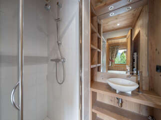 Experience rustic charm and modern convenience in this beautifully appointed bathroom.
