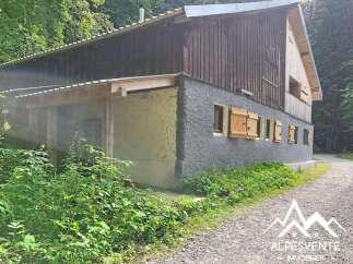 Discover this charming property nestled in a serene forest setting.