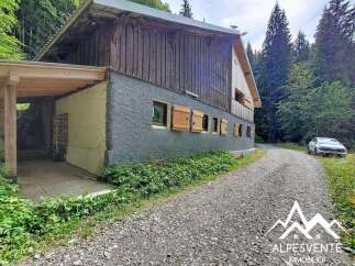 Discover this charming property nestled in a serene forest setting, perfect for those seeking tranquility and a connection with nature.