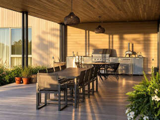 Experience seamless indoor-outdoor living with this stunning covered patio, perfect for entertaining.
