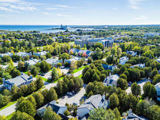 Discover this charming residential neighborhood nestled amongst lush greenery, offering a serene escape with beautiful homes.