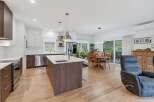 Experience modern living in this open-concept kitchen and dining area, perfect for entertaining.