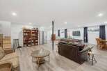Discover this spacious finished basement, perfect for entertainment and relaxation.
