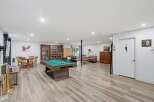 Discover this spacious finished basement, perfect for entertainment and relaxation.