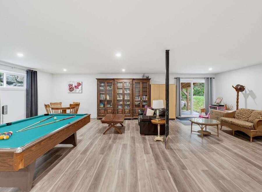 This spacious basement offers a perfect blend of entertainment and relaxation.