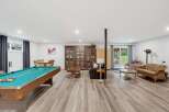 This spacious basement offers a perfect blend of entertainment and relaxation.