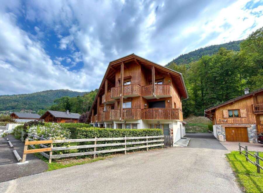 Experience alpine living in this charming wooden chalet, perfect for a mountain getaway.