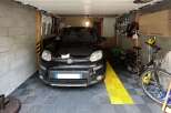 Discover this spacious garage, perfect for protecting your vehicles and storing your belongings.