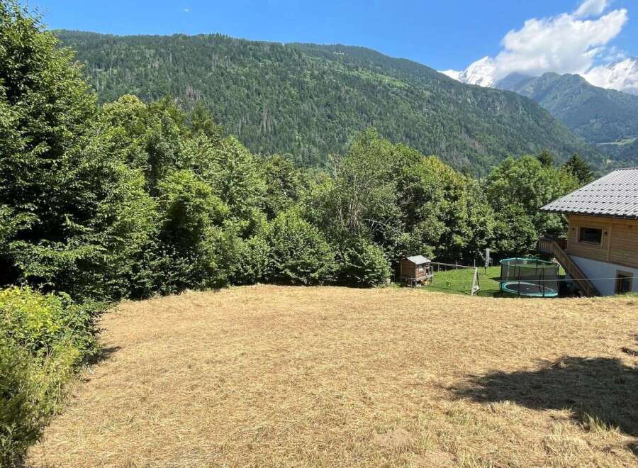 Discover this stunning property nestled amidst lush greenery with breathtaking mountain views.