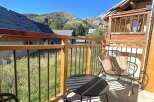 Enjoy breathtaking mountain views from this charming balcony, perfect for morning coffee or evening relaxation.