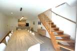 Experience modern living in this spacious open-plan dining and kitchen area, perfect for entertaining.