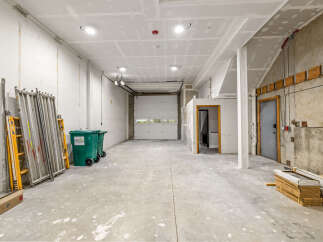This spacious commercial space offers a versatile layout, perfect for a variety of businesses.