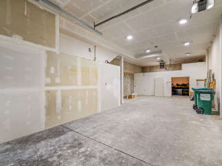 This unfinished commercial space offers a blank canvas for your business vision.
