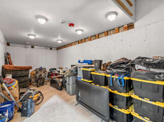 This spacious basement offers ample storage solutions, perfect for organizing your belongings.
