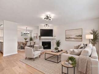 Experience modern living in this beautifully staged living and dining area.