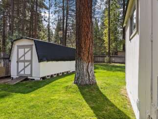 Discover this charming property featuring a spacious backyard perfect for outdoor activities and relaxation.