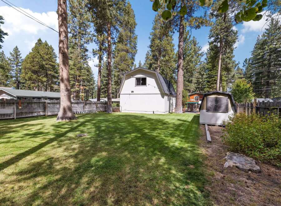 Discover this charming property featuring a spacious backyard perfect for outdoor activities and relaxation.