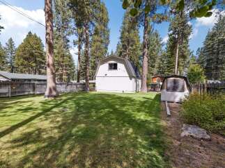 Discover this charming property featuring a spacious backyard perfect for outdoor activities and relaxation.
