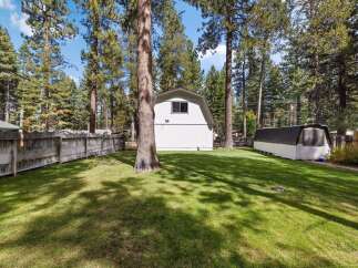 Discover this charming property featuring a spacious backyard perfect for outdoor activities and relaxation.