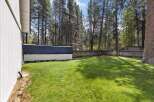 Enjoy the spacious backyard of this property, perfect for outdoor activities and relaxation.