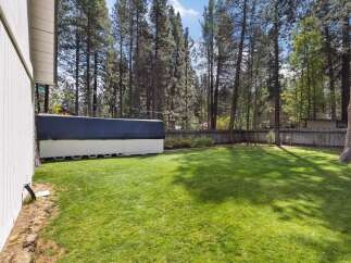 Enjoy the spacious backyard of this property, perfect for outdoor activities and relaxation.