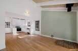Discover this charming home featuring a bright and airy open-concept living space with gleaming hardwood floors.