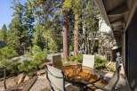 Enjoy your morning coffee or evening drinks on this charming patio, complete with a glass-top table and four chairs.