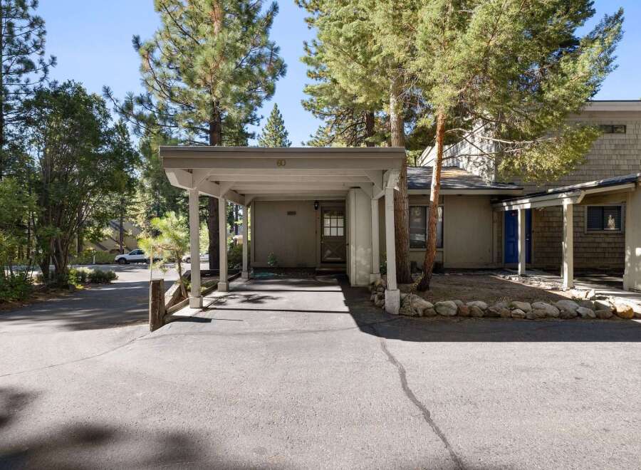 Discover this charming property featuring a convenient carport and a welcoming entrance.