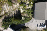 Discover this stunning property featuring a modern building with a durable grey shingle roof, perfect for any climate.