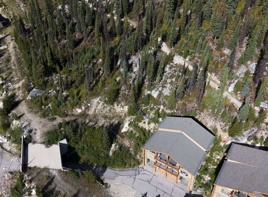 Experience mountain living in this stunning property nestled amidst a lush forest.