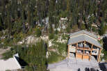 Experience mountain living in this stunning property nestled amidst a dense forest.